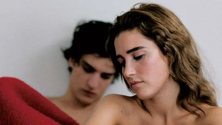 Young couple in a thoughtful, intimate moment